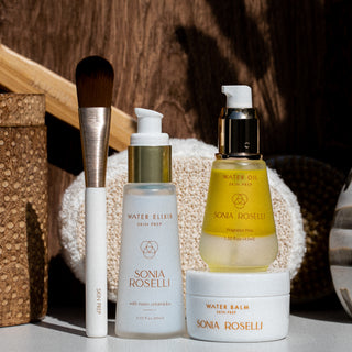 Ageless Beauty trio and skin prep brush on spa background
