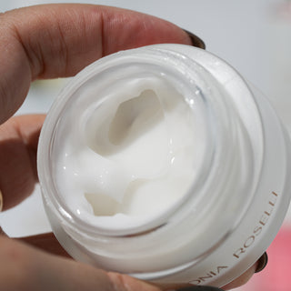 Looking into open jar of intense barrier cream