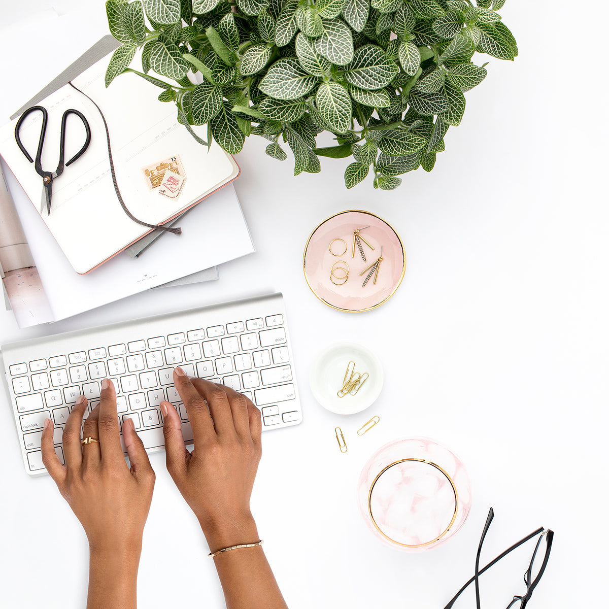 Woman typing on keyboard