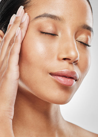 gentle exfoliant for smooth skin showing close up of black woman showing off her skin