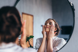 woman using sexapeel in mirror