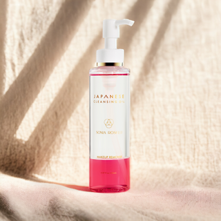 best japanese cleansing oil, on linen background with soft shadows