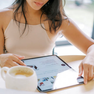 Woman reading ipad