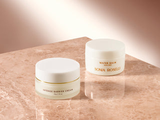 water balm and intense barrier cream on tan marble background