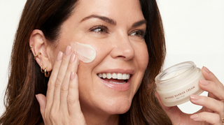 woman applying barrier skincare and intense barrier cream