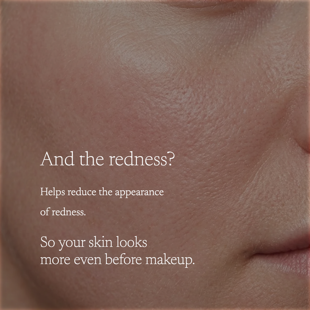 Close-up of a person's cheek and mouth area with overlaid text reading, 'And the redness? Helps reduce the appearance of redness. So your skin looks more even before makeup.