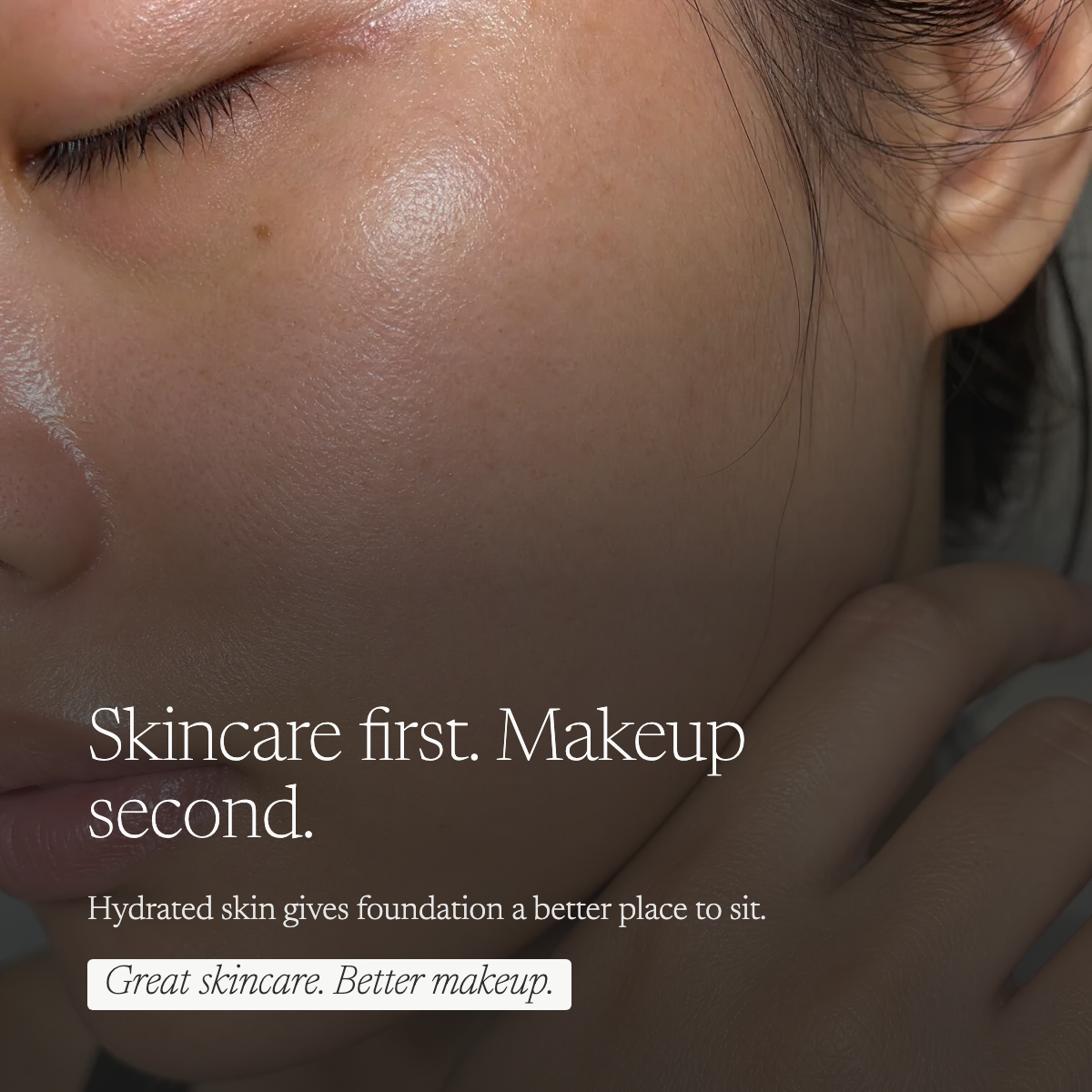 Close-up of a person's face with closed eyes and hand against cheek, showing hydrated, glowing skin. White text reads: 'Skincare first.