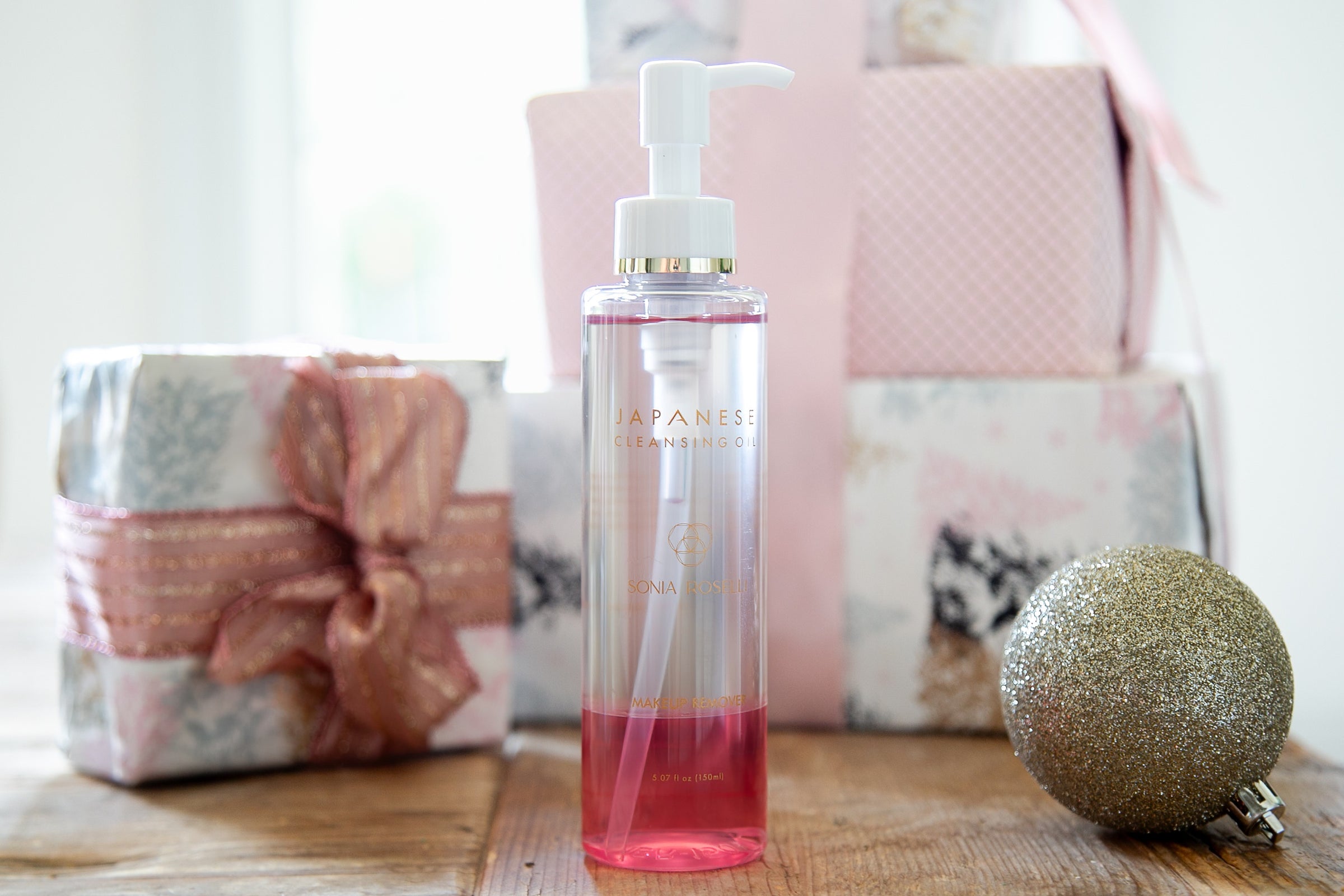 Japanese Cleansing Oil with Holiday gift background