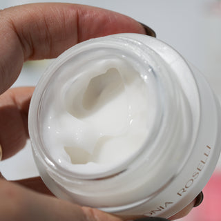 Looking into open jar of intense barrier cream 