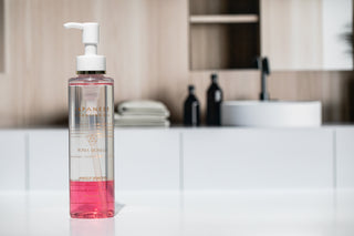 Japanese Cleansing Oil with bathroom backdrop
