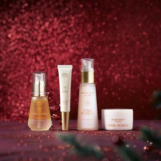 Ageless Beauty Kit on Red Holiday Background