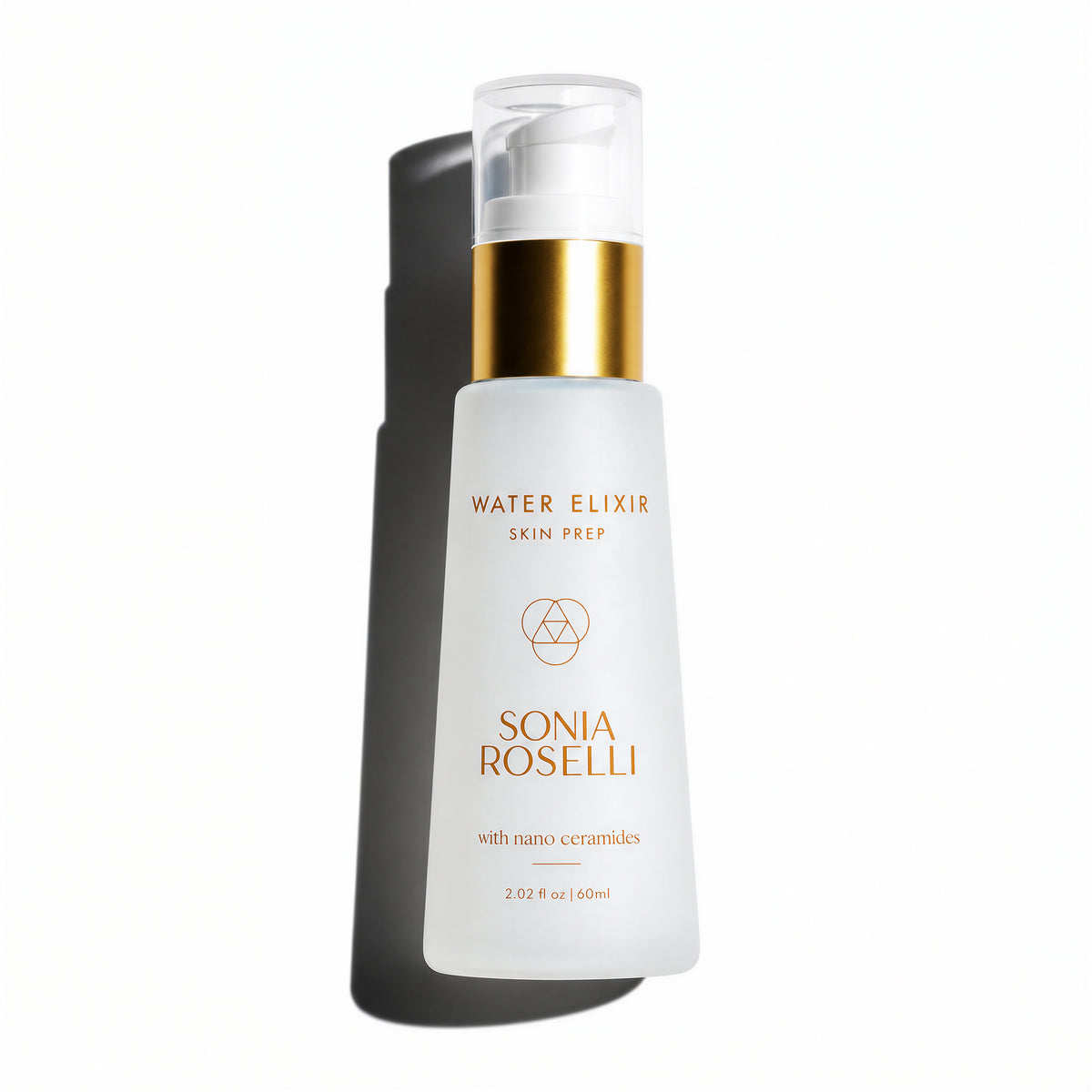 Sonia Roselli Water Elixir Skin Prep in a frosted white bottle with a gold pump collar and clear cap, shown on a white background with a soft shadow.