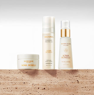 A skincare product set including a peeling gel, water elixir, and water balm, all branded under Sonia Roselli. Texture Relief Kit - 3-piece gentle exfoliation system with Sexapeel, Water Elixir, and Water Balm