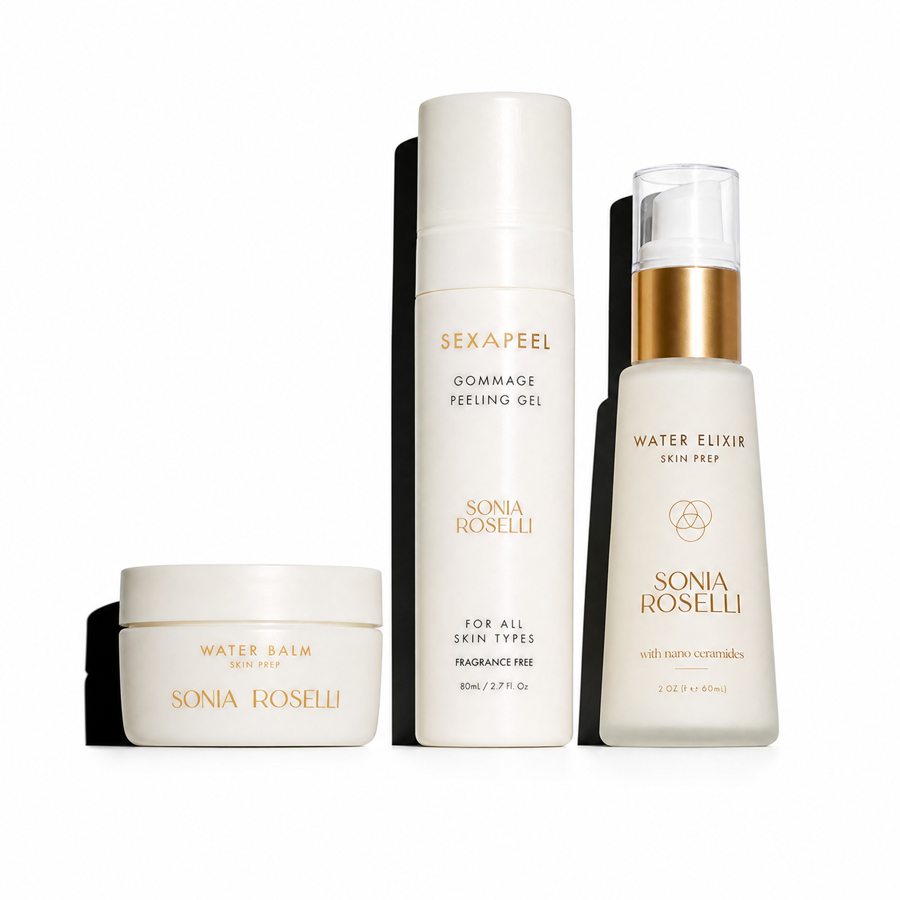 Three skincare products from Sonia Roselli arranged against a black background: a white jar labeled Water Balm, a tall white bottle labeled Gommage Peeling Gel, and a white pump bottle labeled Water Elixir, with gold text and accents.