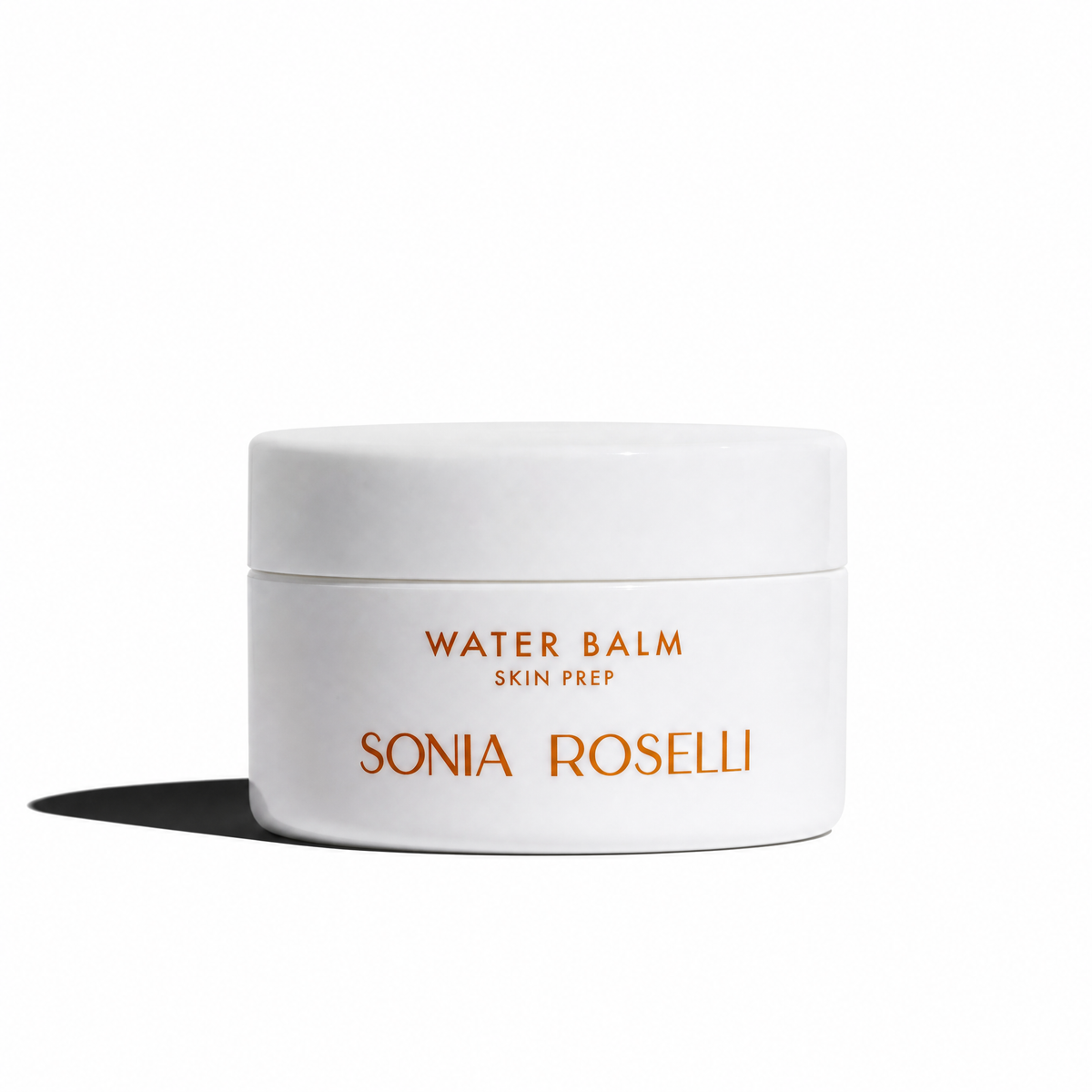 A white cosmetic jar of Sonia Roselli Water Balm Skin Prep with orange text, set against a plain white background with a soft shadow to the left.