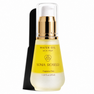 Sonia Roselli Water Oil Skin Prep fragrance-free water oil in a 1.52 fl oz glass bottle with a gold pump and clear cap, shown on a white background with a black shadow.